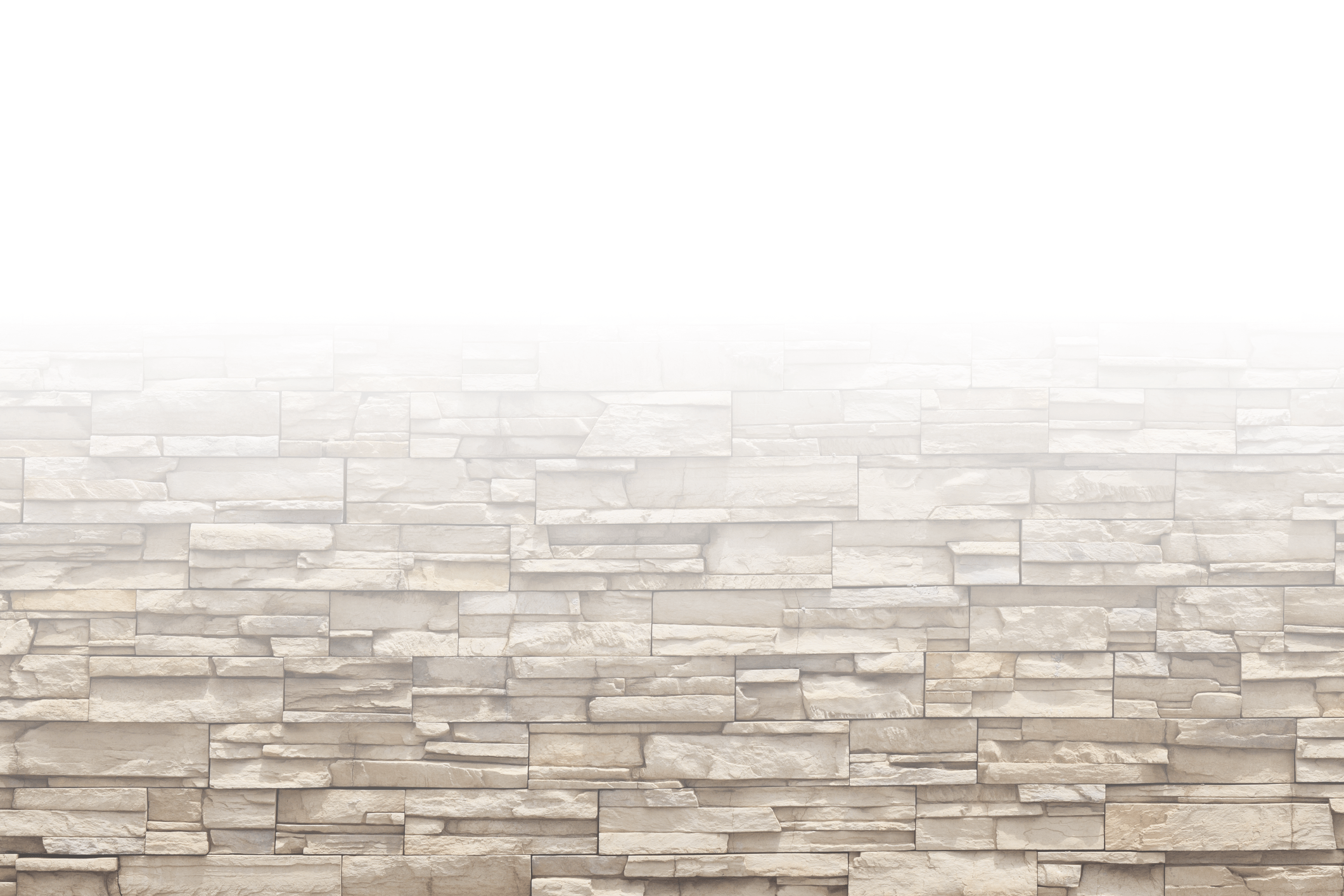 A textured stone wall with horizontal bricks stacked in varying sizes, creating a rustic, natural appearance. Top fades into a bright white.